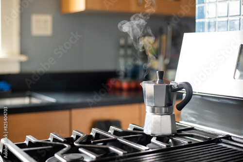 Steamy stovetop espresso maker photo