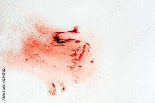 Menstrual blood being washed away photo