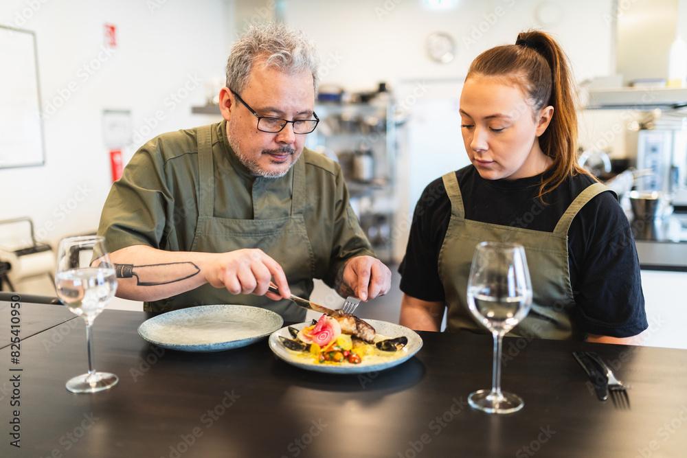 Two chef doing a food tasting Two chef doing a food tasting