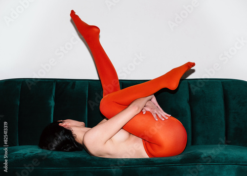Woman with vivid orange tights