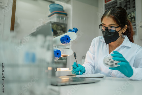 Female biologist doing research 
