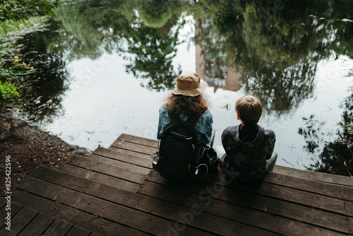 Two Friends Enjoying Lakeside Serenity