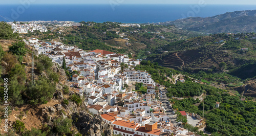 Beautiful aerial view over the famous white village of Frigiliana, Andalusia, Spain. © Wirestock