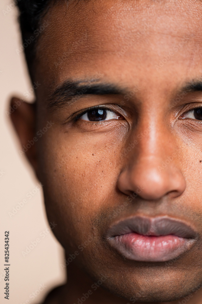 Intense gaze - close-up portrait of a young man Intense gaze - close-up portrait of a young man