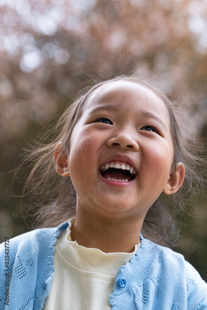 portrait of happy little asian girl laughing portrait of happy little asian girl laughing