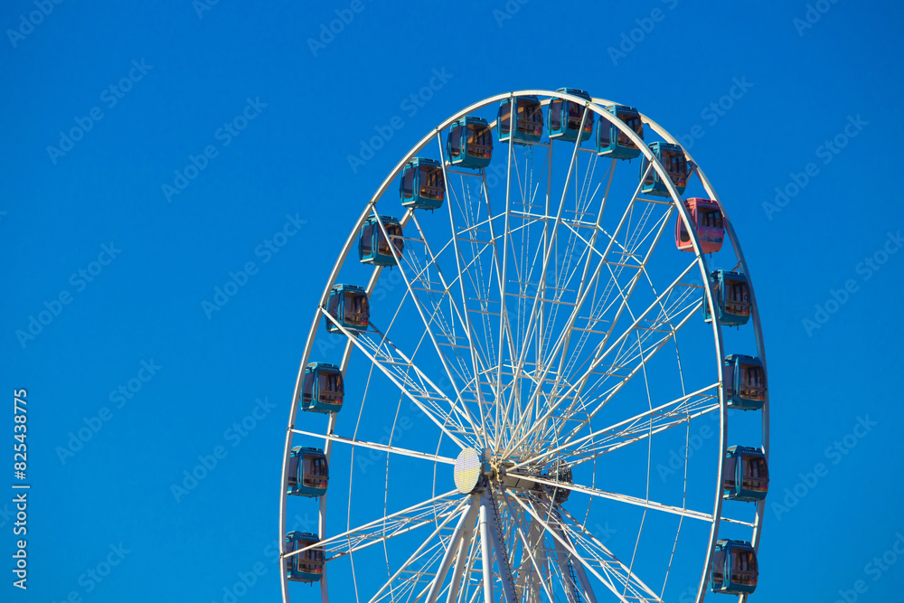 giant wheel sunny day blue sky giant wheel sunny day blue sky