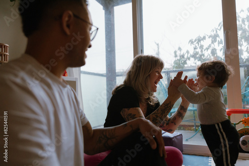 Intimate family interaction in the home photo