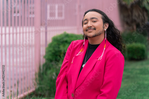 Trans Person Poses Outside for Portrait