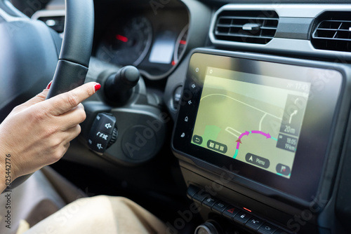 Hand Using Car's Navigation System photo
