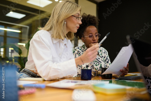 Two businesswomen working at office photo