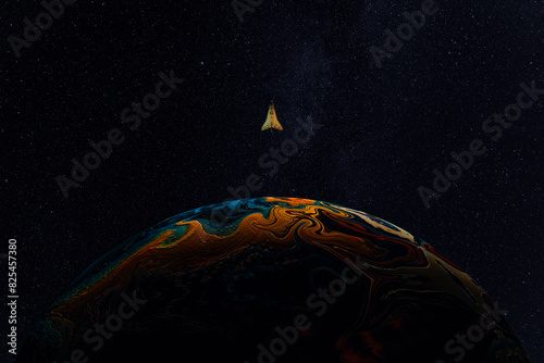 Space shuttle orbiting colorful planet in starry space