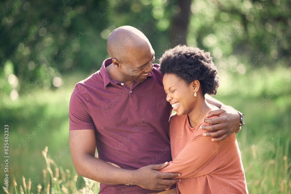 Black couple, happy and hug outdoor in park with love for relationship, communication and commitment. Smiling, man and woman embrace in nature for relaxing, dating fun or bonding on weekend adventure Black couple, happy and hug outdoor in park with love for relationship, communication and commitment. Smiling, man and woman embrace in nature for relaxing, dating fun or bonding on weekend adventure