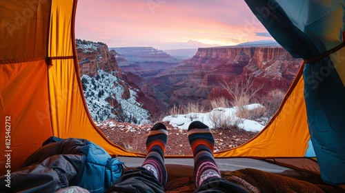 View from a camping tent the Grand Canyon with snow.