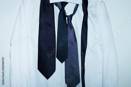 Formal white office business shirt with a ties with hard flashlight
