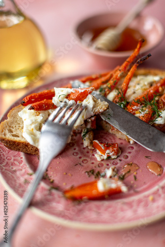 A forkful of roast carrots, toast and whipped feta photo