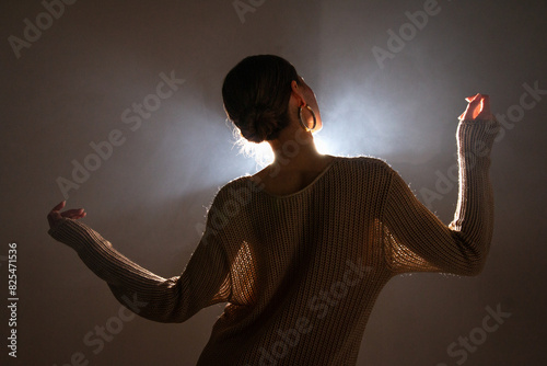 An artistic girls performer silhouette. photo