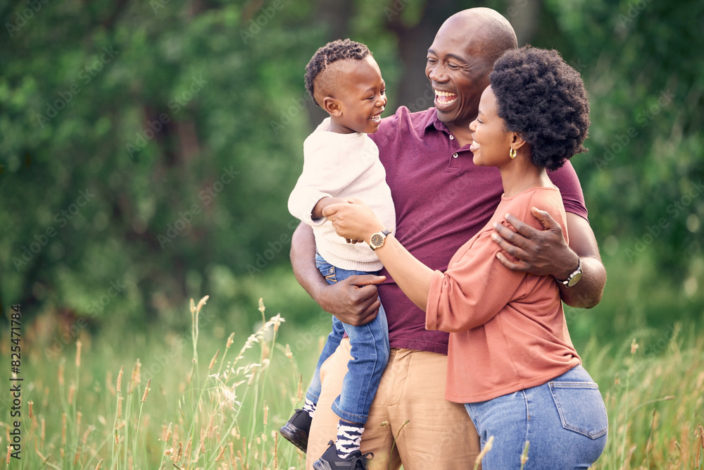 Fototapeta premium Black family, hug and laugh in field for bonding, affection and support in outdoor nature to connect. Parents, son and embrace for security in relationship, travel and funny conversation on vacation
