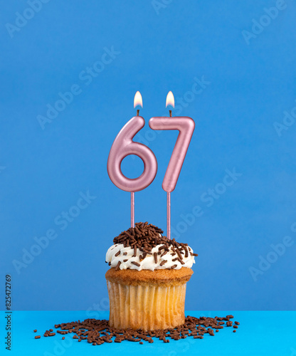 Candle number 67 - Birthday card with cupcake on blue background