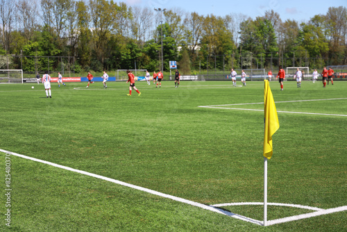 yellow flag at corner of soccer field photo