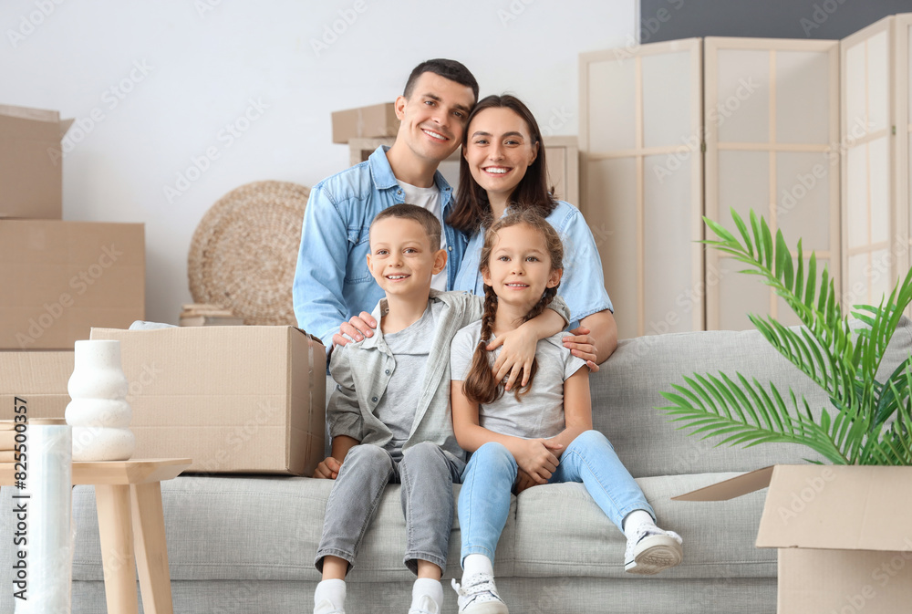 Happy family hugging at home on moving day Happy family hugging at home on moving day