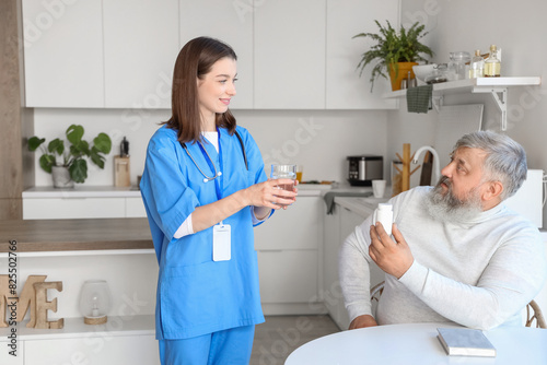 Mature man taking pills fro...