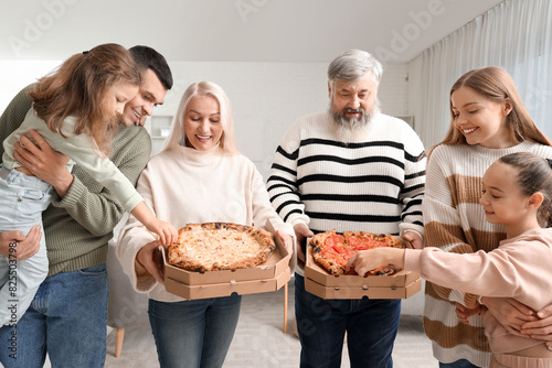 Big family with tasty pizza...