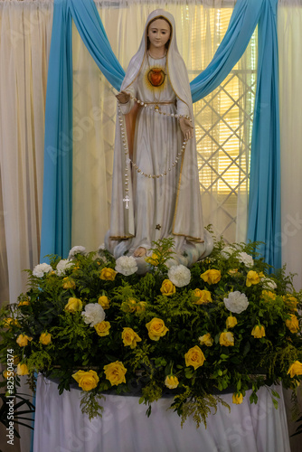 Statue of the image of Our Lady of Fatima, mother of God in the Catholic religion, Our Lady of the Rosary of Fatima, Virgin Mary on the altar in Brazil