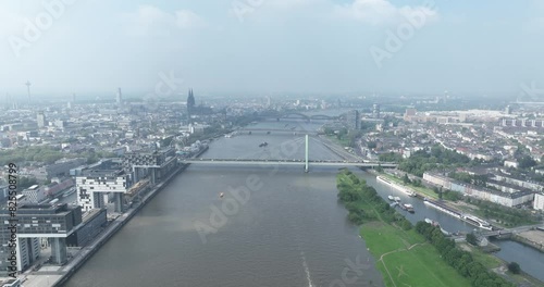 City view over Cologne, north hine westphalia, Germany at the Rheinauhafen, we see the rhine river and bridges infrastructure, city skyline, severingsbrucke, deutzer brucke and the sudbrucke and the photo