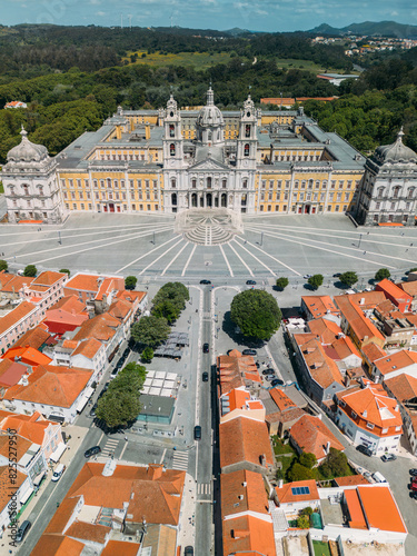 Aerial drone view of Convent of Mafra and lovely village houses, Portugal - UNESCO World Heritage Site