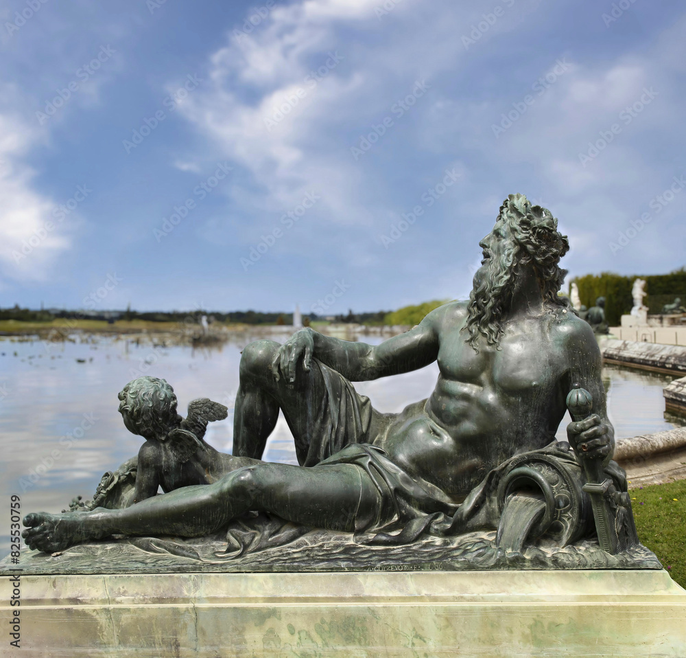 Obraz premium The statues of the Parterre d'Eau of the Palace of Versailles are bronze sculptures representing the rivers of France, created between 1672 and 1690 by important French sculptors