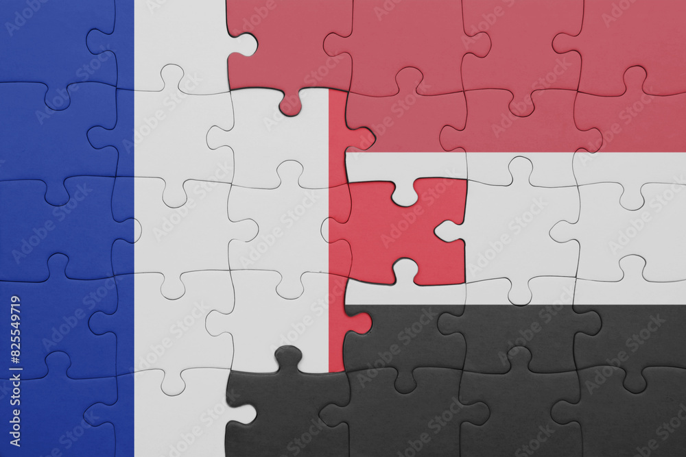 puzzle with the colourful national flag of yemen and flag of france. puzzle with the colourful national flag of yemen and flag of france.