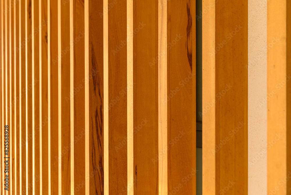 Naklejka premium Elegant background of wooden planks on the wall of a residential building 2