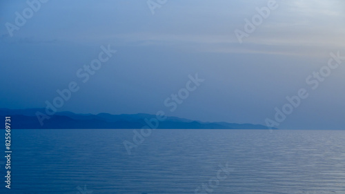 sea ​​view and burning in cyprus after sunset blue hour