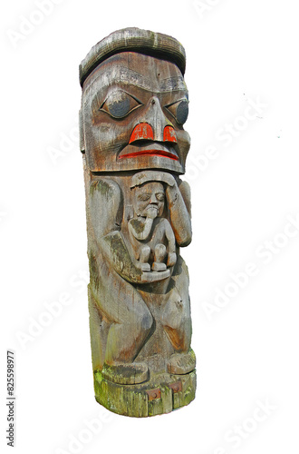 Totem pole carved from cedar photo