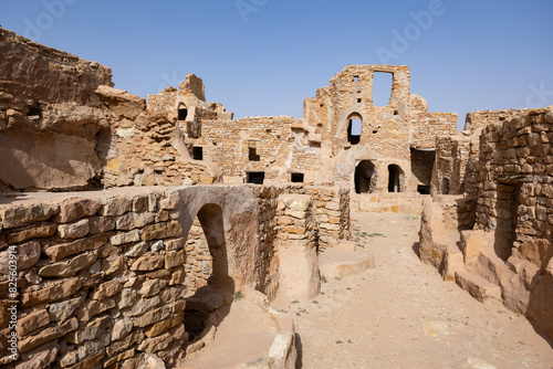 Ruins of ghorfas in ancient Ksar Beni Barka Berber settlement, Tataouine, Tunisia photo