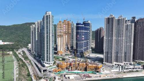 Seaside Commercial residential construction high-rise building site in Lohas Park Tseung Kwan O Hong Kong near Kwun Tong and Kowloon Bay Victoria harbour, Aerial drone Skyview photo