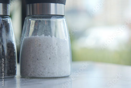 salt in a transparent jar on a table  photo