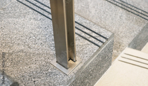 Stainless steel base plate joint of stair balustrade.