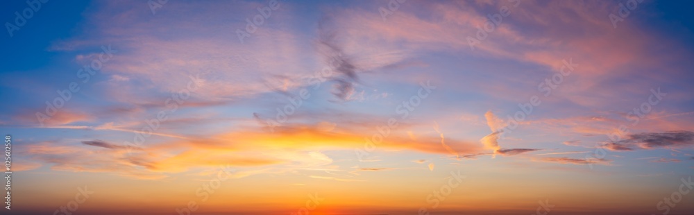 Fototapeta premium Sunset sky panorama with magenta and orange clouds 