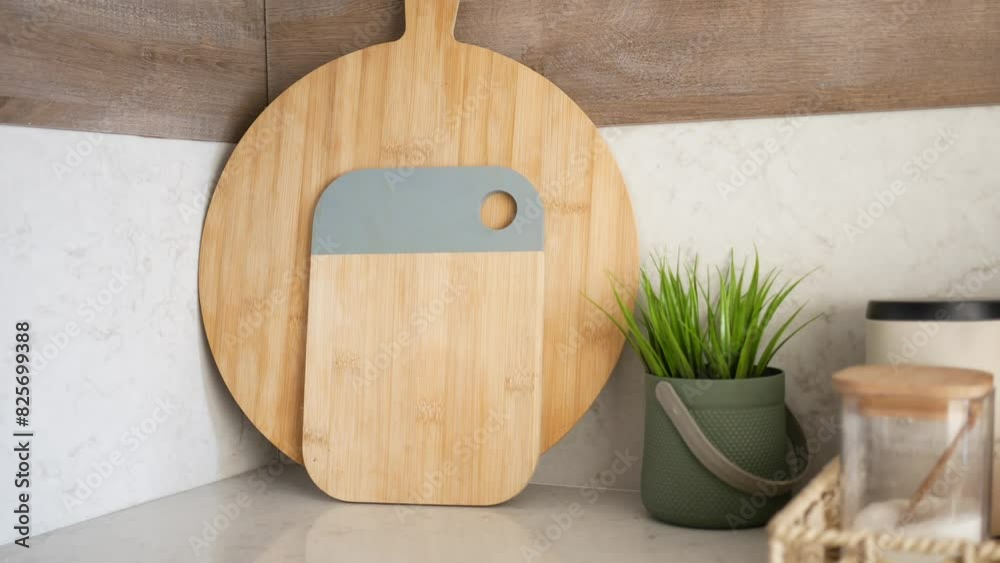 Two wooden handmade craft cutting boards on kitchen