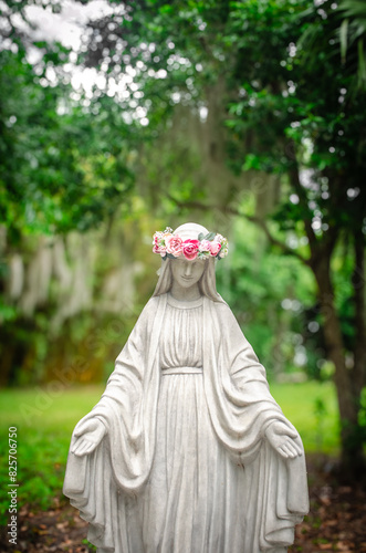 Fotografie Virgin Mary Statue With Flower Crown In Garden Catholic May Crowning