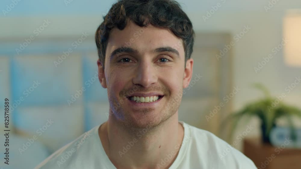 Close up happy Caucasian young man looking at camera toothy dental smile joy fun home bedroom male guy enjoy face expression facial emotion portrait smiling laugh positive relaxation cheerful gesture