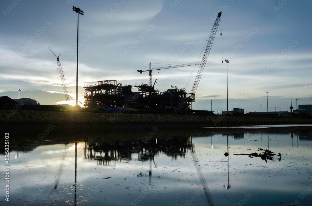 Offshore oil rig platform during construction site in the harbor yard.