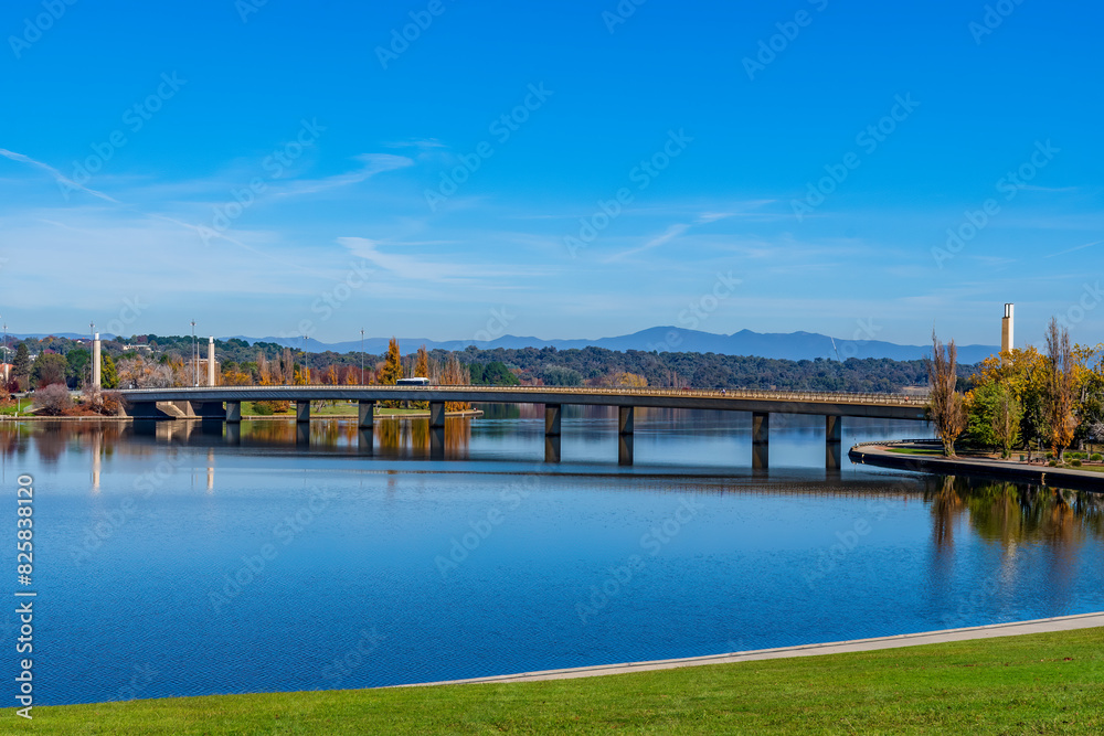 Fototapeta premium An Autumn day at Lake Burley Griffin with bridge and reflections