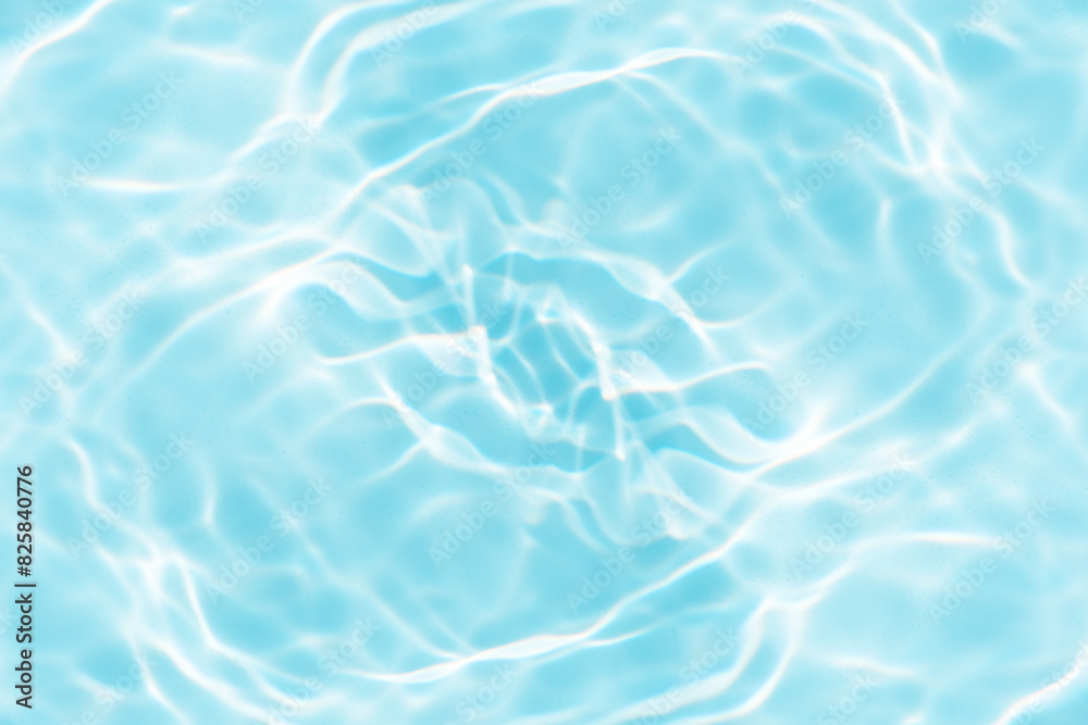 Blue water with ripples on the surface. Defocus blurred transparent blue colored clear calm water surface texture with splashes and bubbles. Water waves with shining pattern texture background. Blue water with ripples on the surface. Defocus blurred transparent blue colored clear calm water surface texture with splashes and bubbles. Water waves with shining pattern texture background.