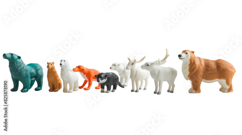 Collection of various toy animals in standing position next to each other photo