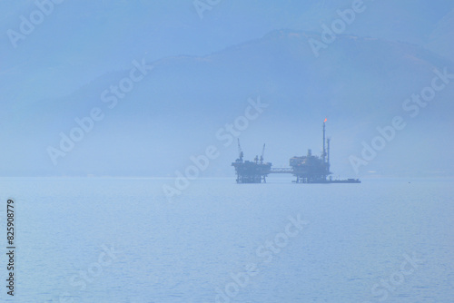marine oil extraction platform in the morning fog - Prinos oil area, near Thassos, Greece, Aegean sea