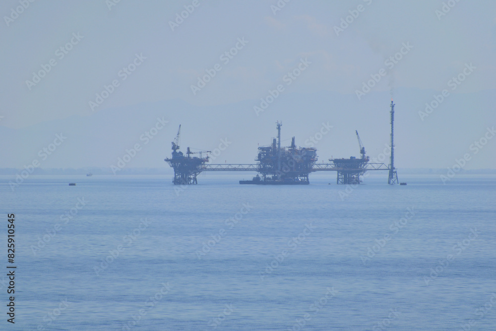marine oil extraction platform in the morning fog - Prinos oil area, near Thassos, Greece, Aegean sea marine oil extraction platform in the morning fog - Prinos oil area, near Thassos, Greece, Aegean sea