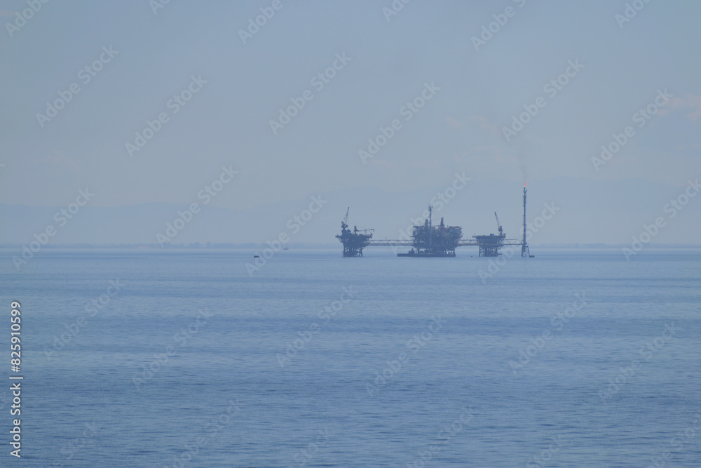 marine oil extraction platform in the morning fog - Prinos oil area, near Thassos, Greece, Aegean sea