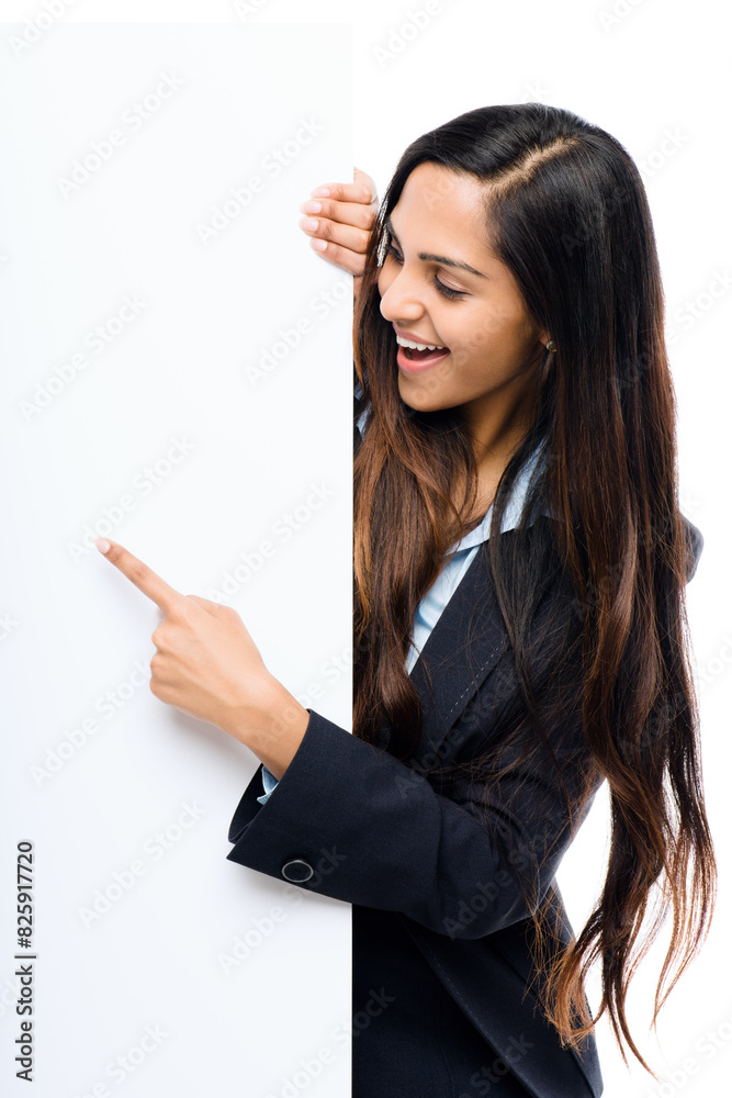 Business, woman and pointing in studio with poster for information, advertising and communication for promotion. Girl, mock up and billboard on white background for brand, logo and corporate news Business, woman and pointing in studio with poster for information, advertising and communication for promotion. Girl, mock up and billboard on white background for brand, logo and corporate news
